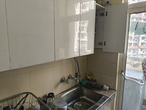 Kitchen in 2 BHK Apartment at Viddhi Tower, Mahagunpuram – for Sale