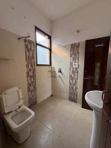 Bathroom in 3 BHK Apartment at Dhakoli – for Sale