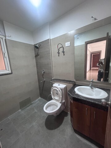 Bathroom in 3.5 BHK Apartment at ATS Homekraft Pious Orchards, Sector 150 – for Rent