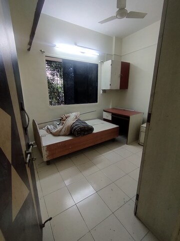 Bedroom in 2 BHK Apartment at Sai Rang Society, Pimple Gurav – for Rent