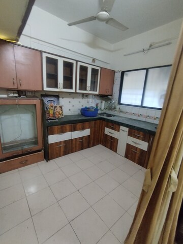 Kitchen in 2 BHK Apartment at Sai Rang Society, Pimple Gurav – for Rent