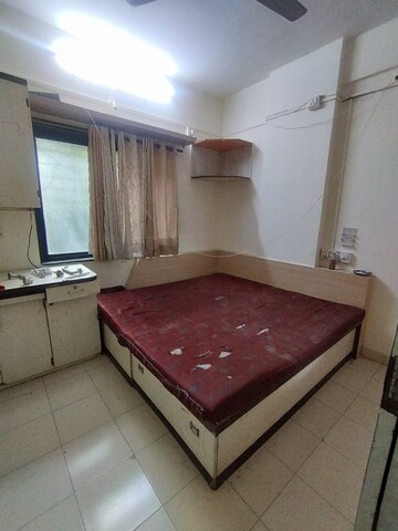 Bedroom in 2 BHK Apartment at Sai Rang Society, Pimple Gurav – for Rent