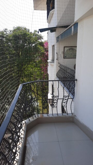 Balcony in 3 BHK Apartment at Marble Arch CHS, Model Colony – for Rent