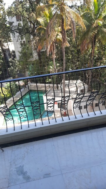 Balcony in 3 BHK Apartment at Marble Arch CHS, Model Colony – for Rent