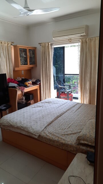 Bedroom in 3 BHK Apartment at Marble Arch CHS, Model Colony – for Rent