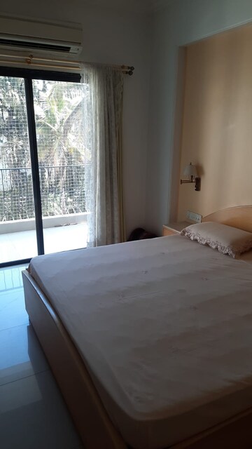 Bedroom in 3 BHK Apartment at Marble Arch CHS, Model Colony – for Rent