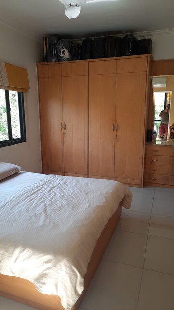 Bedroom in 3 BHK Apartment at Marble Arch CHS, Model Colony – for Rent