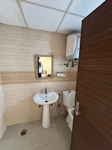 Bathroom in 1 RK Apartment at Supertech Ecociti, Sector 137 – for Rent