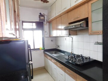 Kitchen in 2 BHK Apartment at Neptune Living Point, Bhandup West – for Rent