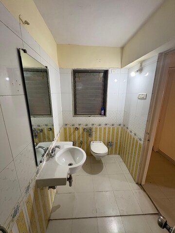 Master Bedroom in 3.5 BHK Apartment at NRI Complex Phase 2, Seawoods – for Rent