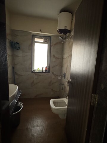 Bathroom in 2 BHK Apartment at Siddhi Highland Park Phase 2, Kailash Nagar – for Rent