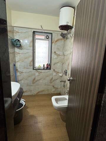 Bathroom in 2 BHK Apartment at Siddhi Highland Park Phase 2, Kailash Nagar – for Rent