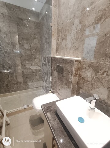Bathroom in 4 BHK Builder Floor at Green Park – for Sale