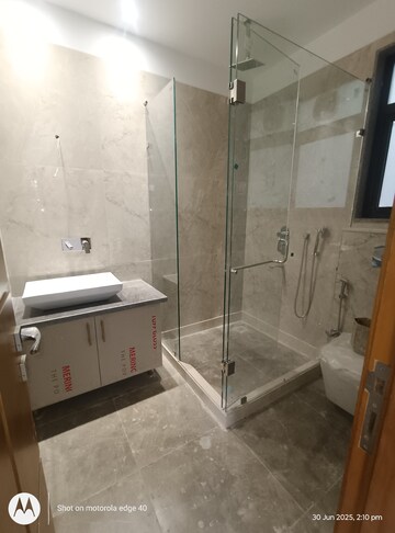 Bathroom in 4 BHK Builder Floor at Green Park – for Sale