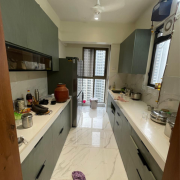 Kitchen in 2 BHK Apartment at Raymond Realty Phase II, Swastik Garden – for Rent