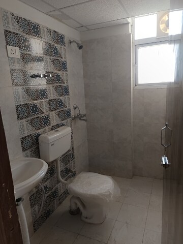 Bathroom in 2 BHK Apartment at Signature Global Proxima, Sector 89 – for Rent
