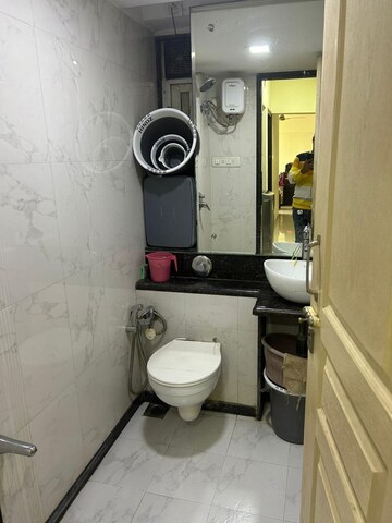 Bathroom in 2 BHK Apartment at Swapnalok Towers, Malad East – for Rent