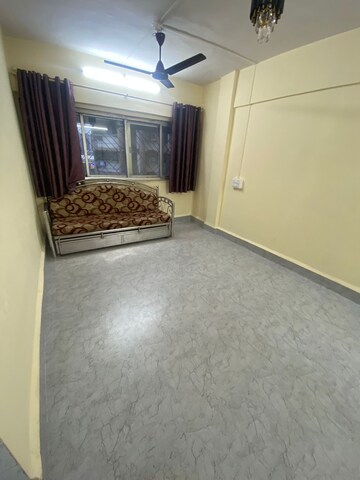 Bedroom in 1 BHK Apartment at Asmita Jyoti CHS, Malad West – for Rent