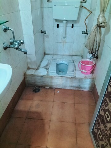 Bathroom in 1 BHK Apartment at Dheeraj Valley, Goregaon East – for Rent