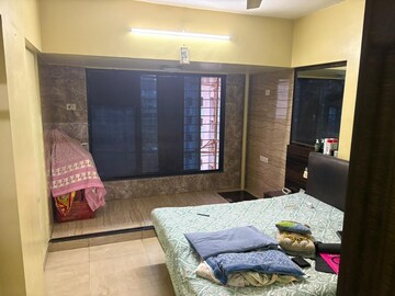 Living Room in 2 BHK Apartment at Radha Govind, Borivali East – for Rent