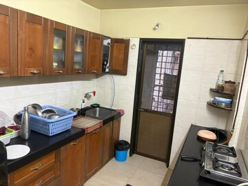 Kitchen in 2 BHK Apartment at Radha Govind, Borivali East – for Rent