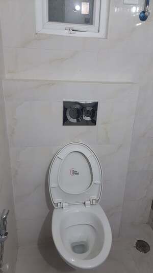 Bathroom in 4 BHK Apartment at Paradigm Business Hermitage Park, Dhakoli – for Sale