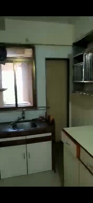 Kitchen in 2 BHK Apartment at Seagull Apartment, Tardeo – for Sale