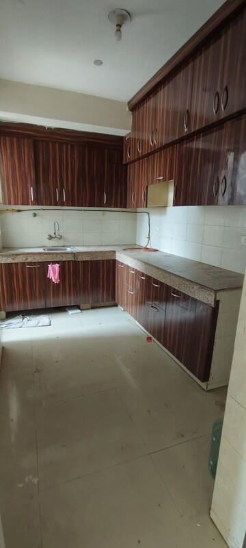 Kitchen in 2 BHK Apartment at Logix Blossom Greens, Sector 143 – for Sale