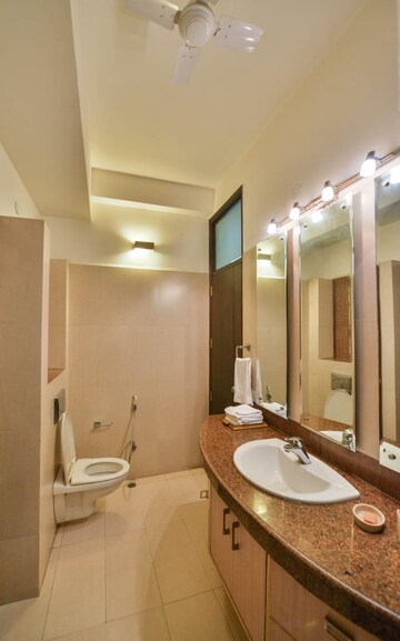 Bathroom in 4 BHK Apartment at Panchsheel Park – for Rent