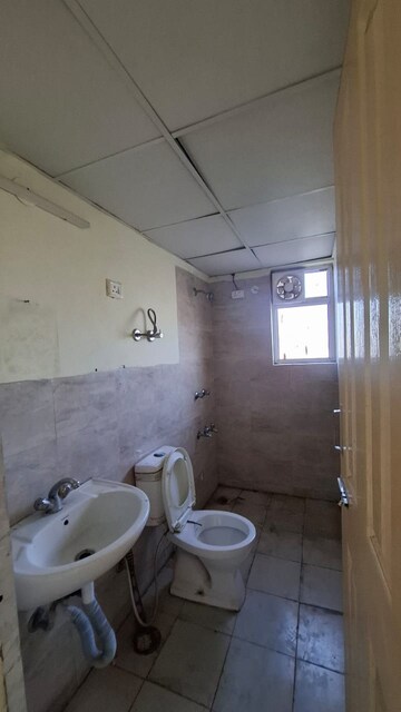 Bathroom in 3 BHK Apartment at Wave Dream Homes, Wave City – for Rent