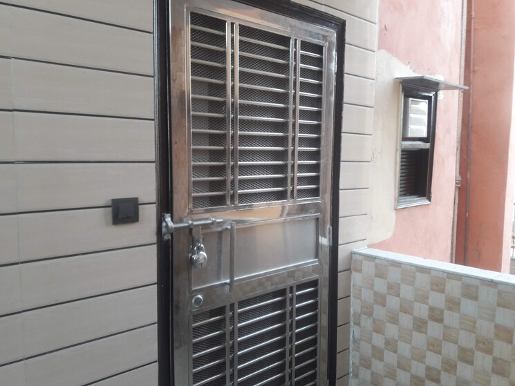 Balcony, vivekanand-apartments 2 Bedroom 900 Sq.Ft. Apartment In Rohini Sector 8 Delhi 8925219