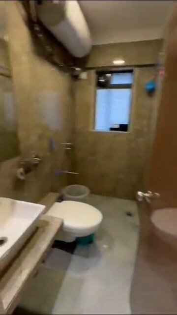 Bathroom in 2 BHK Apartment at Andheri CHS, Andheri West – for Rent