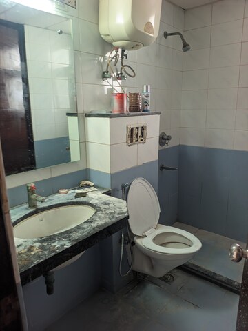 Bathroom in 2 BHK Apartment at Eros Kenwood Tower, Sector 39 – for Rent
