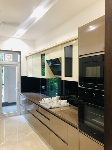 Kitchen in 3 BHK Builder Floor at Dlf Phase I – for Sale
