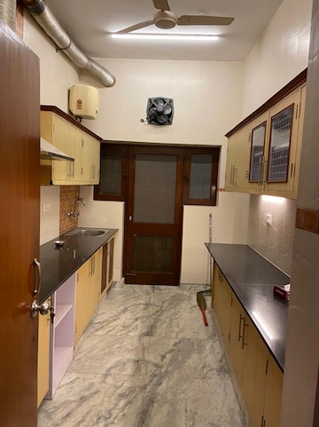 Kitchen in 4 BHK Apartment at Safdarjung Development Area – for Rent