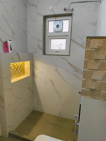 Bathroom in 4 BHK Apartment at Geetanjali Enclave – for Rent