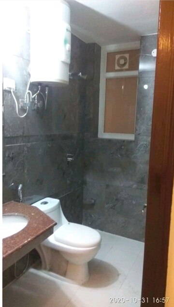 Bathroom in 4 BHK Apartment at Abhinandan CGHS, Sector 51 – for Rent