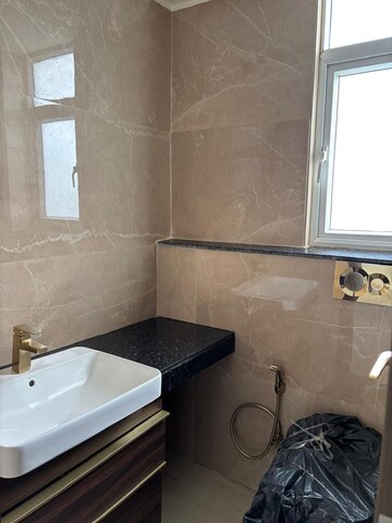 Bathroom in 3 BHK Apartment at Smart World Orchard, Sector 61 – for Rent