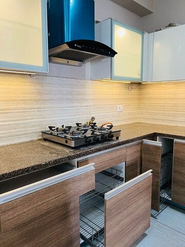 Kitchen in 3.5 BHK Apartment at ABA Cleo County, Sector 121 – for Rent