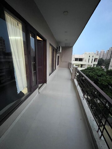 Balcony in 4 BHK Apartment at Ansal Sushant Lok I, Sector 43 – for Rent