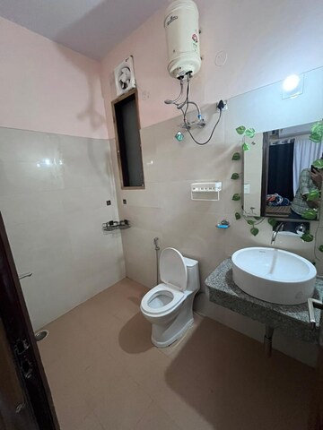 Bathroom in 4 BHK Apartment at Ansal Sushant Lok I, Sector 43 – for Rent