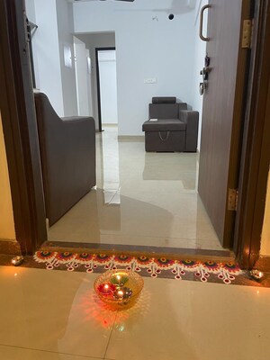 Living Room in 1 BHK Apartment at Lodha Palava City, Dombivli East – for Sale