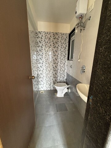 Bathroom in 1 BHK Apartment at Puraniks City Reserva, Ghodbunder Road – for Rent