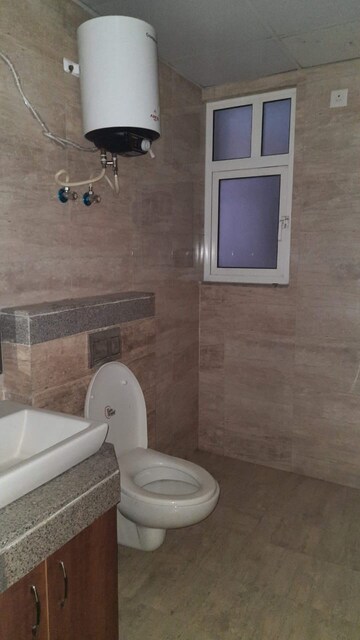 Bathroom in 2 BHK Apartment at Shapoorji Pallonji Joyville Gurgaon, Sector 102 – for Rent