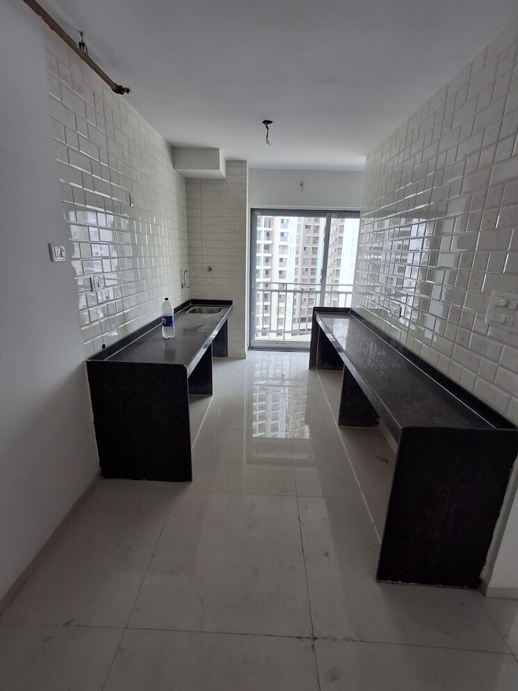 Kitchen, mutha-sai-nirvana 2 Bedroom 1085 Sq.Ft. Apartment In Shahad Thane 8926011