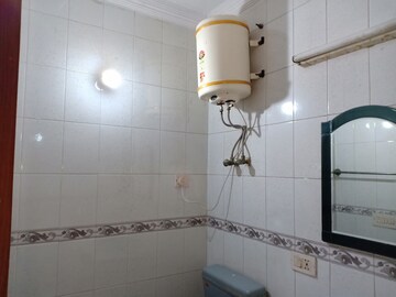 Bathroom in 3 BHK Apartment at Shivalik Colony – for Rent