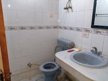Bathroom in 3 BHK Apartment at Shivalik Colony – for Rent