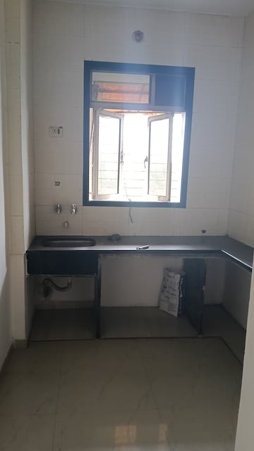 Kitchen in 1 BHK Apartment at Gangeshwar Tower, Dombivli West – for Sale
