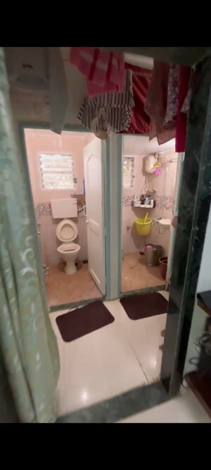 Bathroom in 1 RK Apartment at Nagari Niwara CHS, Goregaon East – for Sale