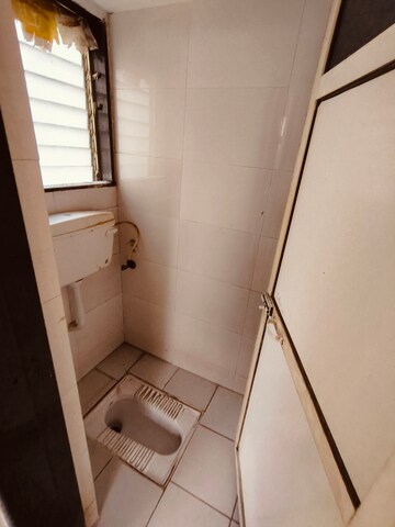Bathroom in 1 BHK Apartment at Shri Kambeshwar Heights, Morya Nagar – for Rent